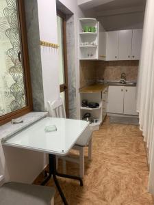 Η κουζίνα ή μικρή κουζίνα στο Fabio's Apartament +8 φωτογραφίες