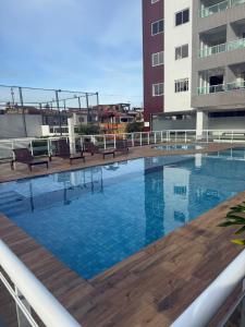 Swimmingpoolen hos eller tæt på Apartamento confortável 2 quartos, Piscina, Playground, Sauna em Belém