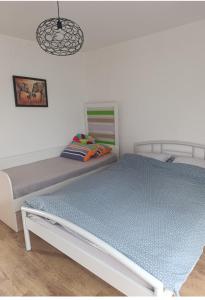 Postel nebo postele na pokoji v ubytování Vikendica kuca za odmor "Joly"