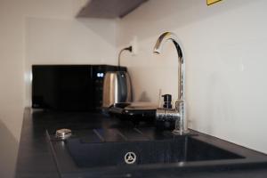 Nhà bếp/bếp nhỏ tại Apart Comfort +29 ảnh