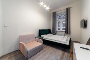 Giường trong phòng chung tại Apart Comfort