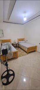 Ένα ή περισσότερα κρεβάτια σε δωμάτιο στο charming apartment