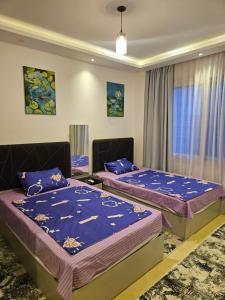 Ένα ή περισσότερα κρεβάτια σε δωμάτιο στο Sharm Hills +44 φωτογραφίες