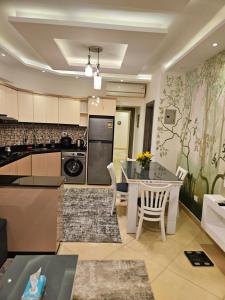 Η κουζίνα ή μικρή κουζίνα στο Sharm Hills