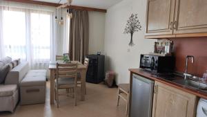 Η κουζίνα ή μικρή κουζίνα στο Nature Escape to Pirin Golf