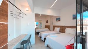 Ένα ή περισσότερα κρεβάτια σε δωμάτιο στο Pousada Beach Claudia