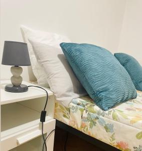 Ένα ή περισσότερα κρεβάτια σε δωμάτιο στο Appartement entier en cœur de ville