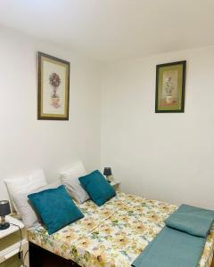 Ένα ή περισσότερα κρεβάτια σε δωμάτιο στο Appartement entier en cœur de ville