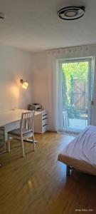 Ένα ή περισσότερα κρεβάτια σε δωμάτιο στο Cozy Room in München