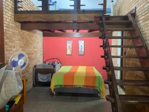 En eller flere senge i et værelse på Refúgio do Rio