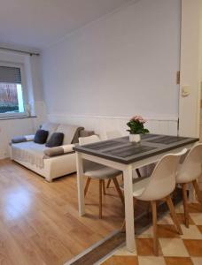 Et opholdsområde på Apartament Juliusz Slowacki + 6 billeder