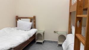 Postel nebo postele na pokoji v ubytování In The Peaks