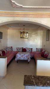 Una cama o camas en una habitación de ksar sghir,Tanger Med