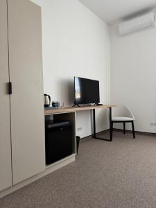 Μια τηλεόραση ή/και κέντρο ψυχαγωγίας στο Pokoje Dębowa Góra