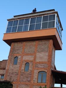 Budova, kde se apartmán nachází + 1 fotografie