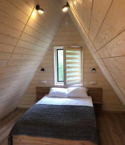 Postel nebo postele na pokoji v ubytování Pyramida House