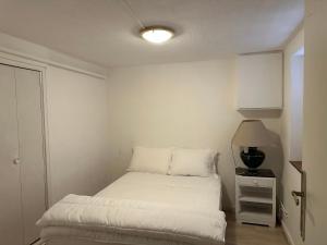 En eller flere senge i et værelse på Montluçon Centre ville maison