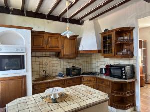 Køkken eller tekøkken på Montluçon Centre ville maison