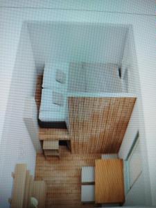 a rendering of a room with a bed at Schlaffass und Tiny House am See, Spa mit Sauna und Hot Tub, angeln, Boot, Natur in Twist