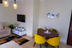 Fotografie z fotogalerie ubytování Modern Oasis 5 Mins to Acacia Mall CJs and Padel v destinaci Kampala