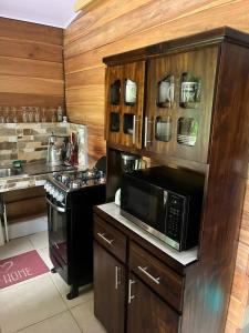 Una cocina o cocineta en casa sol