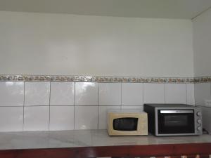 Η κουζίνα ή μικρή κουζίνα στο Chez JO