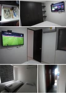 a room with a flat screen tv and a living room at 2 Habitaciones 2Aires Reservas SL in Cúcuta +2 photos