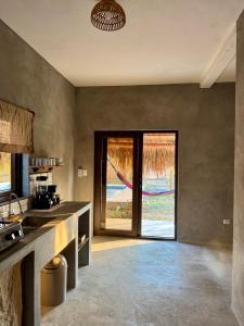 Η κουζίνα ή μικρή κουζίνα στο Mis Hibis