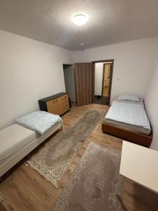 En eller flere senge i et værelse på Speedstay oberhausen