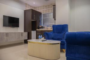 Televisyen dan/atau pusat hiburan di شقق جوانة Joanna Serviced Apartments
