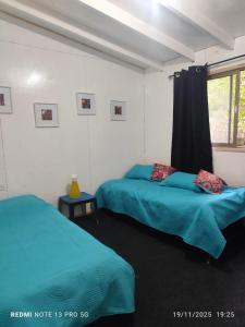 Postel nebo postele na pokoji v ubytování Rosa de los vientos Sur + 20 fotografií