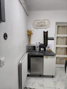 Η κουζίνα ή μικρή κουζίνα στο Neuw room Calaisis