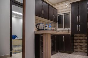 Dapur atau dapur kecil di شقق جوانة Joanna Serviced Apartments