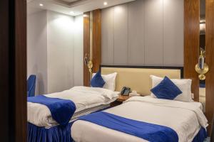 Katil atau katil-katil dalam bilik di شقق جوانة Joanna Serviced Apartments +20 gambar