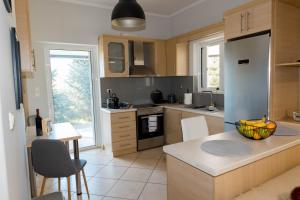 Kuchyň nebo kuchyňský kout v ubytování An Oasis In Nature