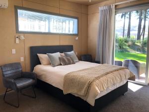 Postel nebo postele na pokoji v ubytování The Claim Accommodation