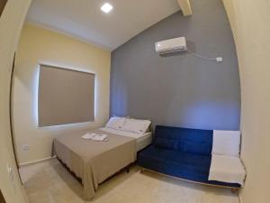 Ένα ή περισσότερα κρεβάτια σε δωμάτιο στο Casa Bela Vila +84 φωτογραφίες