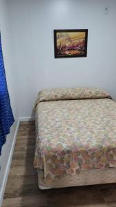 En eller flere senge i et værelse på Cuchilla Alta, un paraíso