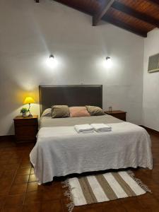 En eller flere senge i et værelse på Departamento Bitcoins House Gutenberg