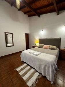 En eller flere senge i et værelse på Departamento Bitcoins House Gutenberg