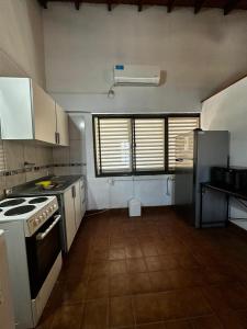 Køkken eller tekøkken på Departamento Bitcoins House Gutenberg