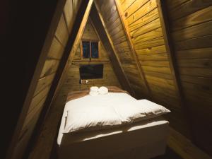 Кровать или кровати в номере cabana suiça