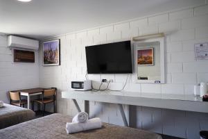 Μια τηλεόραση ή/και κέντρο ψυχαγωγίας στο Bendigo Motor Inn