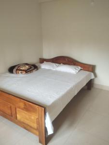 Ένα ή περισσότερα κρεβάτια σε δωμάτιο στο 2 Bedroom Shreeji Kunj +31 φωτογραφίες