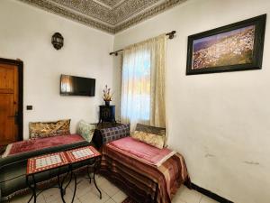 Μια τηλεόραση ή/και κέντρο ψυχαγωγίας στο Riad el Anaqa +51 φωτογραφίες