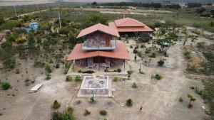 an overhead view of a building with a roof at Chalé Gravatinha in Mucugê