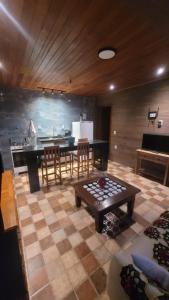 Kuchyň nebo kuchyňský kout v ubytování Chalé Gravatinha