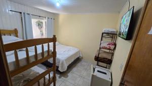 Postel nebo postele na pokoji v ubytování Pousada Miniférico + 52 fotografií