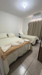 Postel nebo postele na pokoji v ubytování Pousada Atalaia