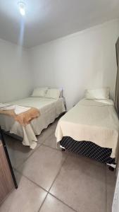 Postel nebo postele na pokoji v ubytování Pousada Atalaia + 1 fotografie